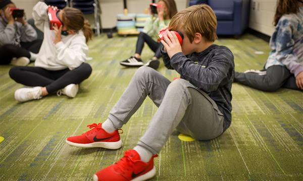 Students use virtual reality headsets